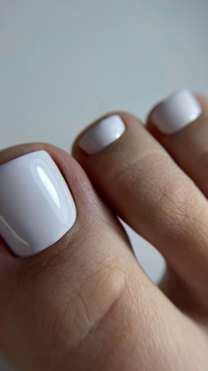Mẫu nail chân màu trắng họa tiết hoa văn Pháp Mẫu nail chân màu trắng họa tiết hoa văn Pháp