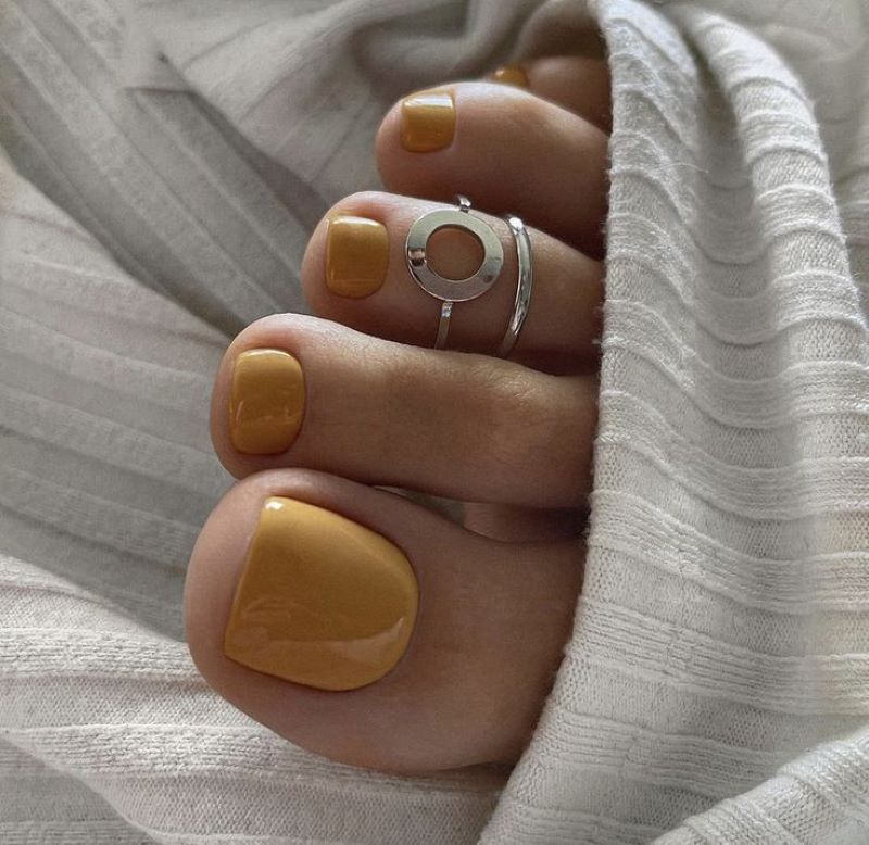 Mẫu nail chân màu cam đất trẻ trung Mẫu nail chân màu cam đất trẻ trung