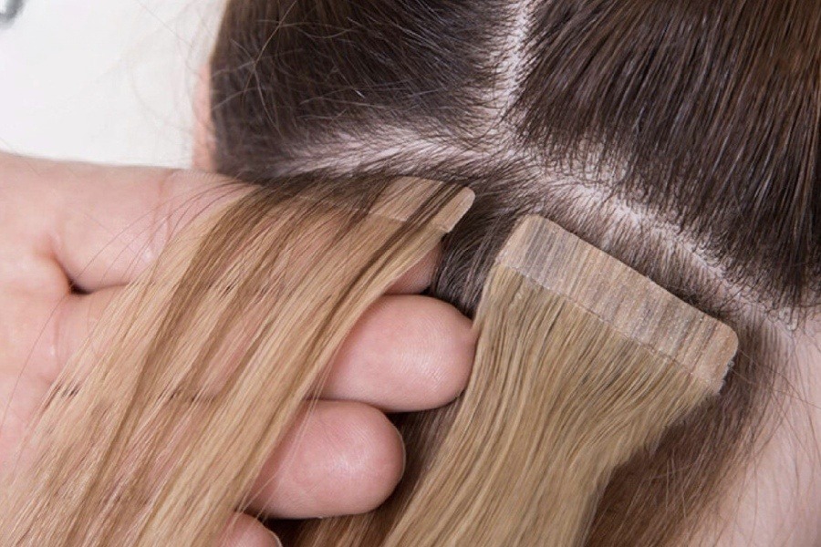 Tháo tóc nối keo bằng dầu dưỡng