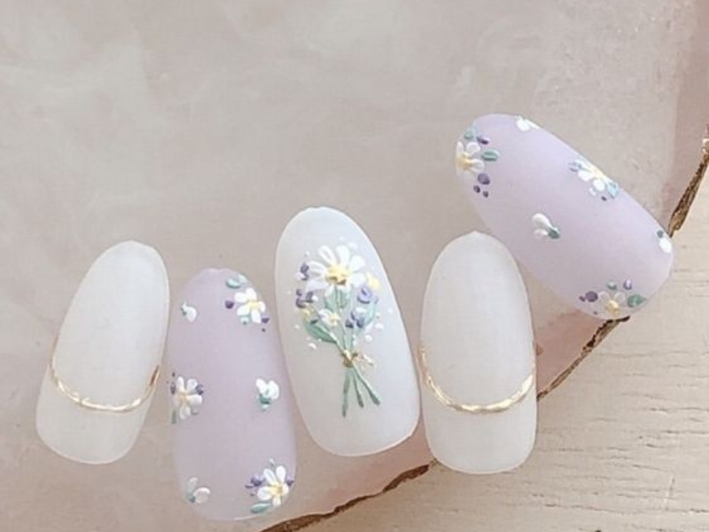 Nail box họa tiết hoa cỏ mang đến sự dịu dàng, tự nhiên